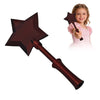 A dark brown 3D printed magic wand with a star head and a handle, held by a young girl.