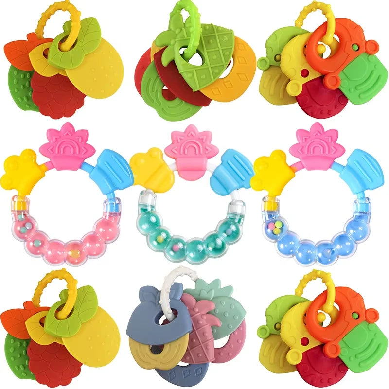 Assortment of colorful silicone baby teethers for soothing gums, including fruit and animal shapes.