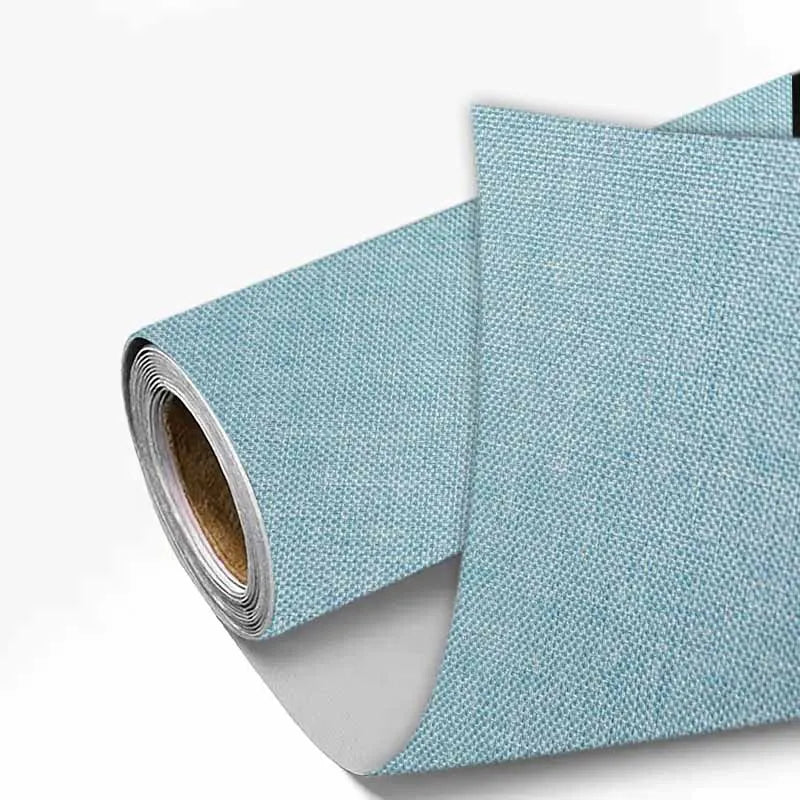 Roll of light blue linen book binding cloth used for albums and scrapbooks