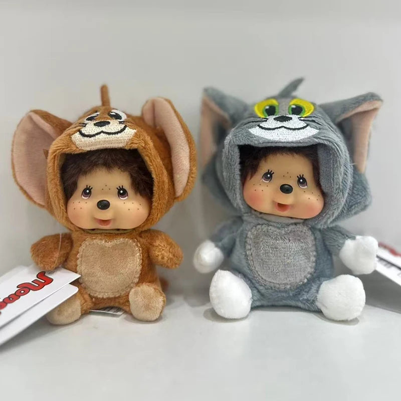 A pair of cute gray and brown animal plush toys with cat-like features.