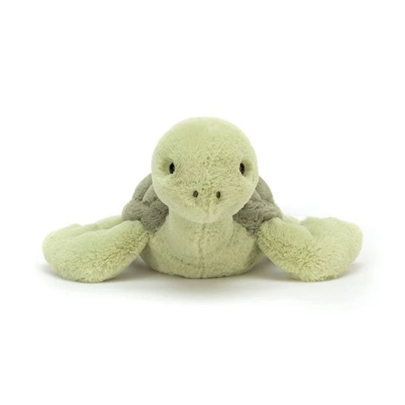 A soft, light green simulated turtle plush doll with a round body and flippers.