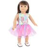 A doll wearing a pink and purple unicorn themed outfit with a sparkly skirt and mane.