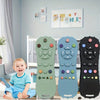 Three colored remote control shaped silicone chew toys for babies displayed in a bright room.