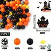 A set of 25 silicone beads in various colors and black designs for Halloween jewelry and crafting.