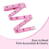 A pink soft tape measure set for sewing and body measurements with multiple rulers shown against a light background.