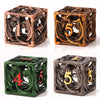 A set of four metal dice featuring a dragon design and numbered faces 1, 5, 4, and 5 in various colors.