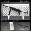 A 1/6 scale MP40 submachine gun model kit displayed on a white grid, with separate bracket parts shown below.