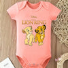 A pink baby bodysuit featuring a Disney The Lion King print of Simba and Nala.