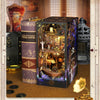 A DIY pirate ship book nook kit featuring a detailed wooden bookshelf insert model and decorative elements.