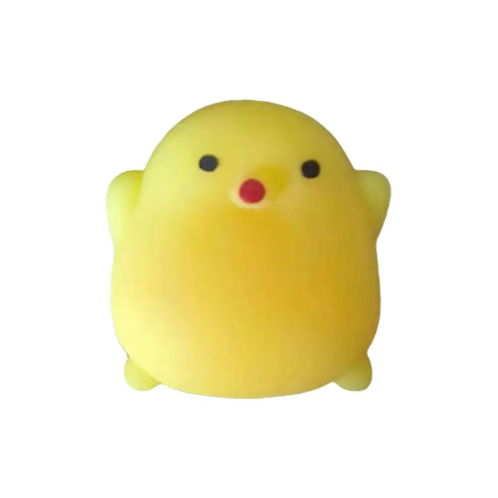 A yellow squishy toy shaped like a chick with a red beak.