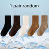 Five pairs of random women's fleece-lined slouch socks in black, brown, white, and tan are displayed against a snowy backgrou