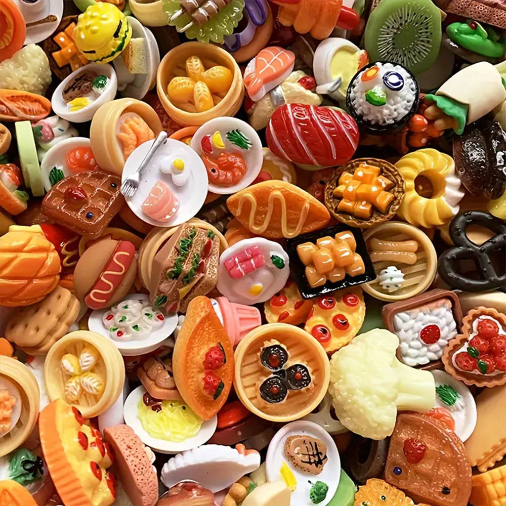 A close-up of a miniature dollhouse food set featuring various colorful snacks, cakes, and treats.