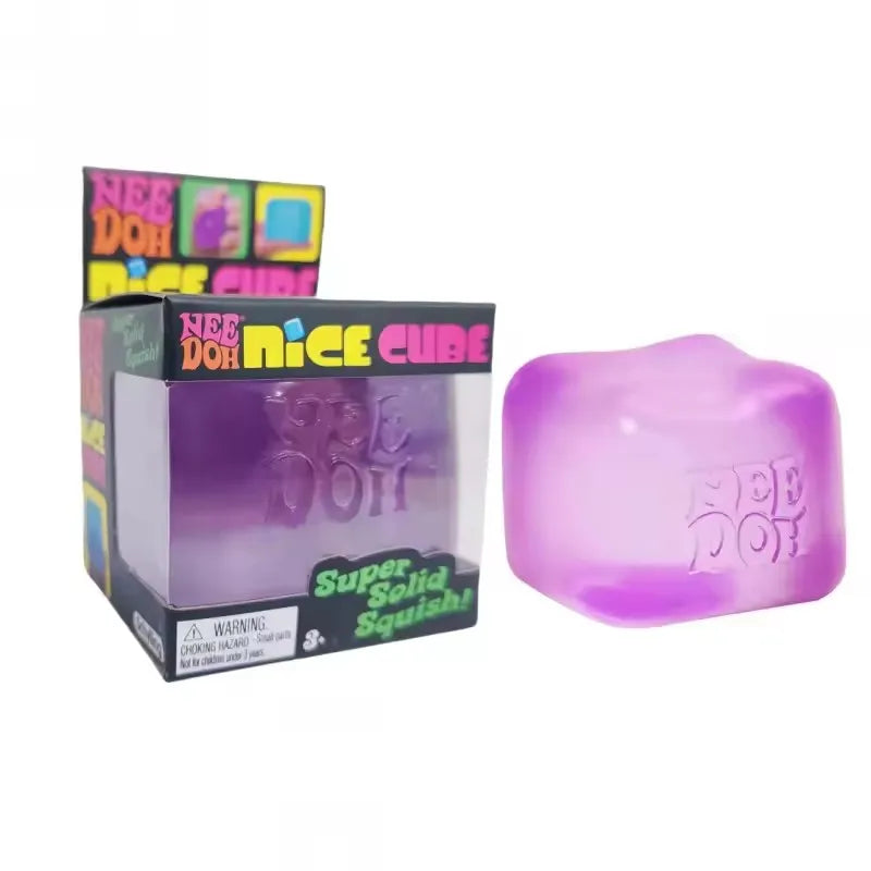 A purple Nee Doh nice cube sensory fidget toy packaged in its box.