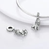 Sterling silver lion charm bead with a bail and a textured design