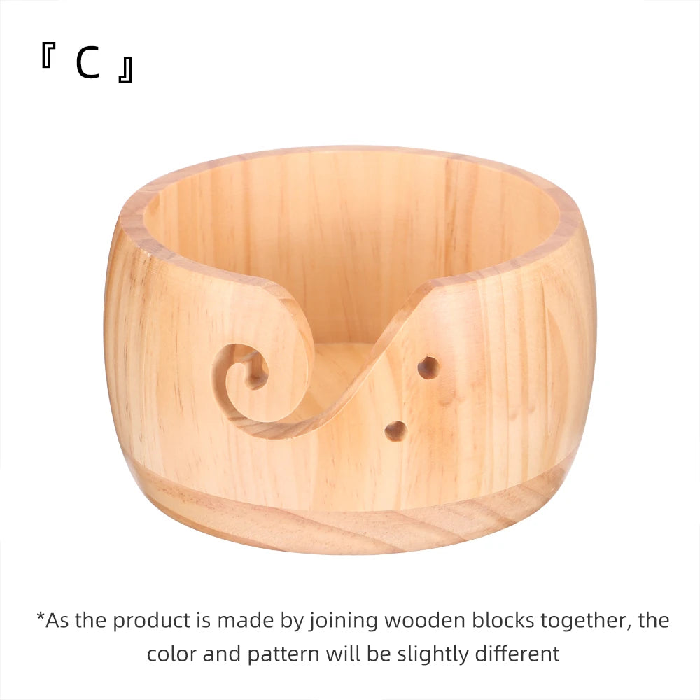 Handcrafted wooden yarn bowl with a swirl cutout, made by joining wooden blocks.