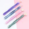 A set of five resin diamond painting pens with interchangeable metal tips in purple, blue, pink, and green hues.