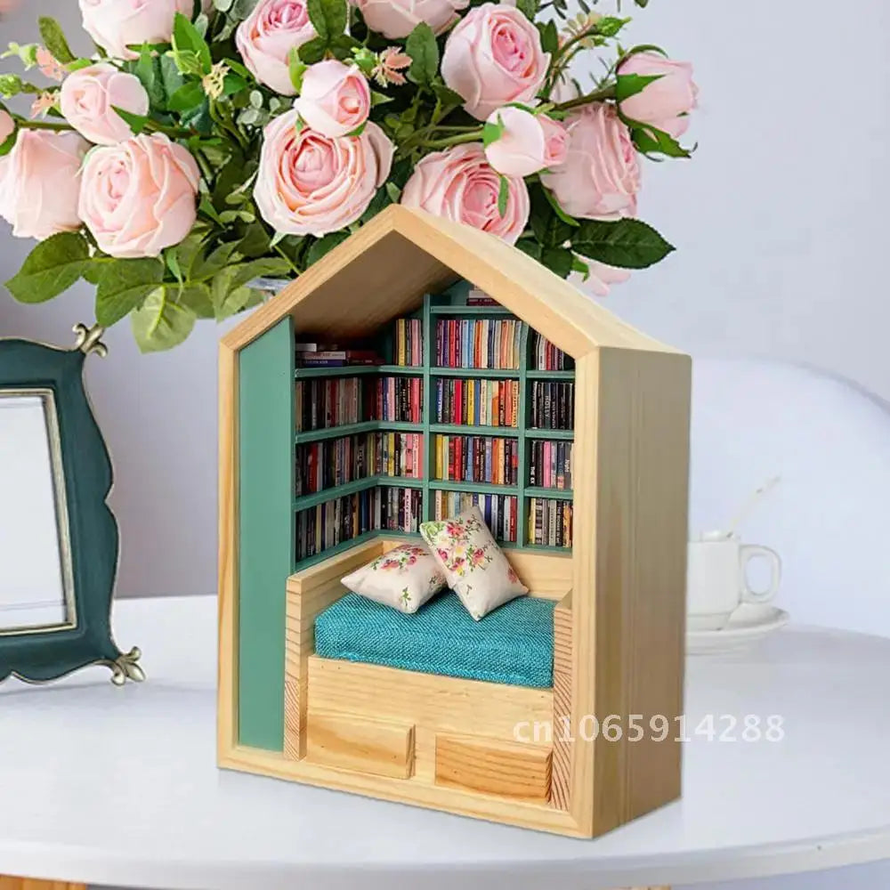 A wooden miniature bookshelf decor set filled with colorful books, displayed next to pink roses.