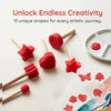 A collection of 13 unique red foam stamps with wooden handles arranged on a white surface for artistic projects.
