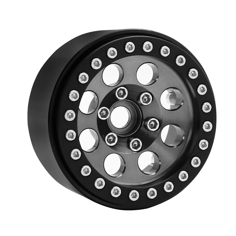 Black metal beadlock wheels for an RC crawler with a removable hex hub.
