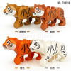 Set of six wooden tiger models in brown and white colors for building blocks