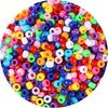 A circular arrangement of colorful pony beads in various shades including pink, yellow, blue, and red.