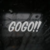White text saying GOGO!! is displayed on a dark, blurred background with water droplets.