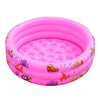 A pink inflatable kids play pool with a cartoon fish design.