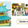 A set of retro Chinese villa micro building blocks showing a multi-tiered pavilion with a tiled roof and surrounding garden v