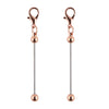 A pair of rose gold metal keychain bars with lobster clasps for DIY jewelry making.