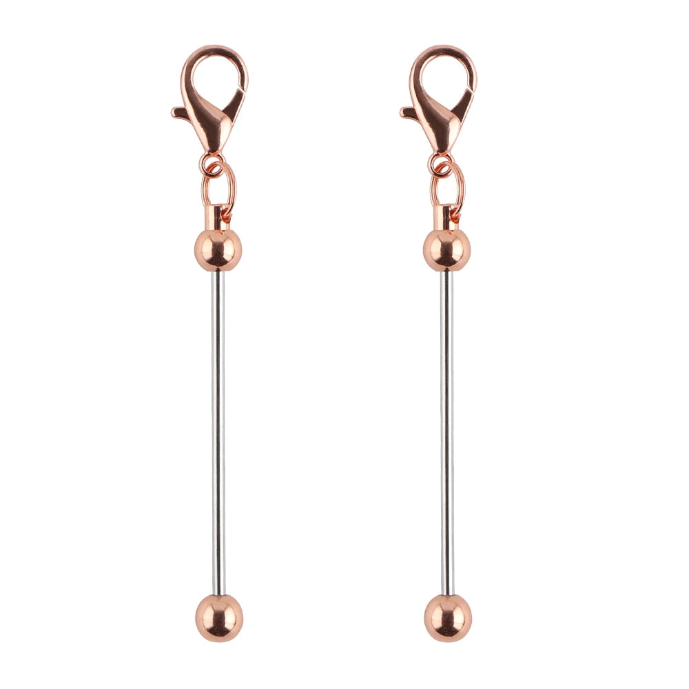 A pair of rose gold metal keychain bars with lobster clasps for DIY jewelry making.