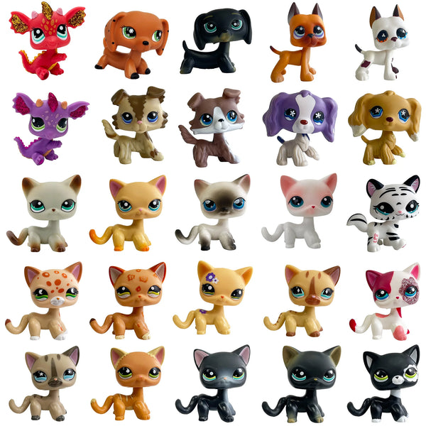 A collection of various collectible pet kitten figures in different colors and styles.