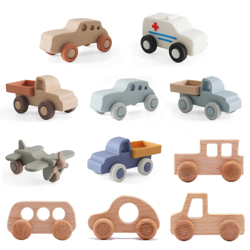 A collection of wooden and silicone car teether toys in various colors and shapes for babies.