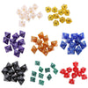 A collection of acrylic polyhedral dice in various colors and shapes for tabletop role-playing games
