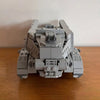 A gray LEGO model of an Imperial Troop Transport featuring detailed armor and structures.