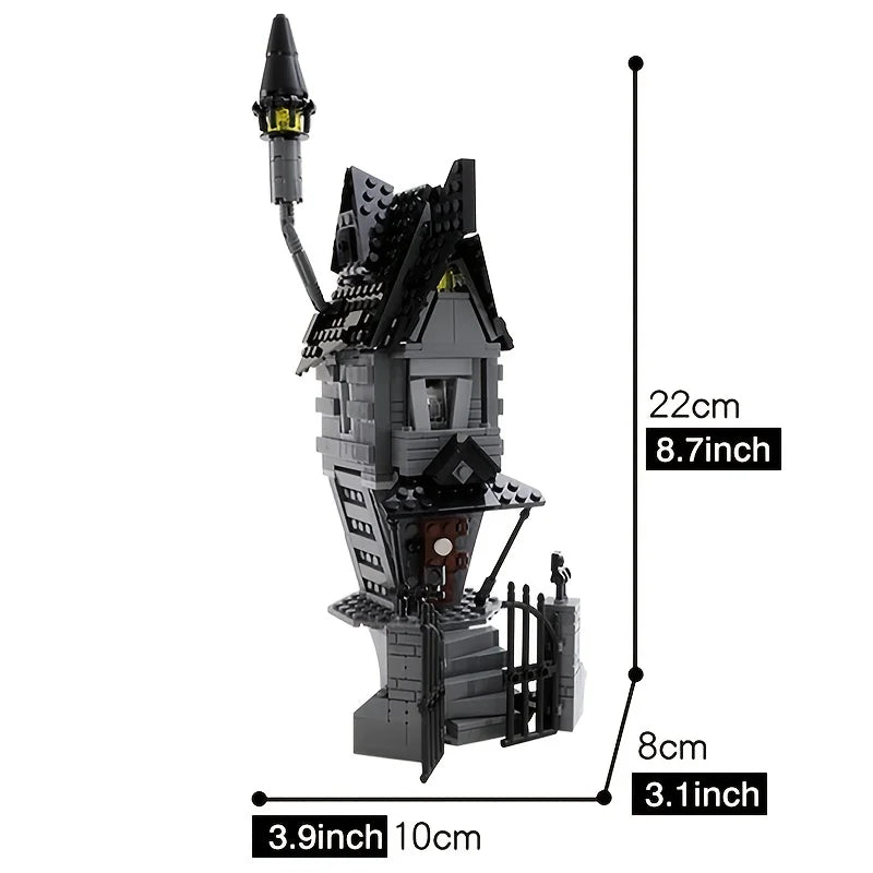 A black haunted house building block set with a pointed roof and surrounding fence structure.