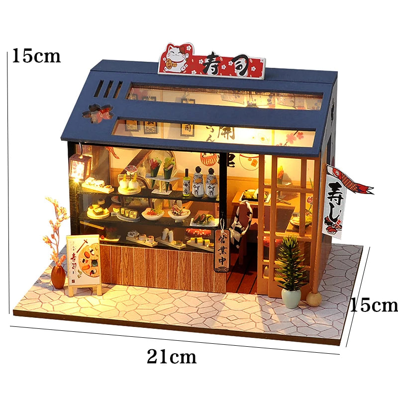 A wooden miniature Japanese restaurant dollhouse kit featuring a display case and interior food items.