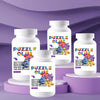 Three white glass bottles of puzzle glue with purple and yellow puzzle pieces are displayed on a purple surface.