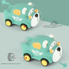 A light green pull-back toy car with a smooth front wheel and a threaded rear wheel, demonstrating friction features.