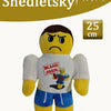 A yellow plush toy resembling a character from a slasher game, with the text Shedletsky Forsaken visible above it.