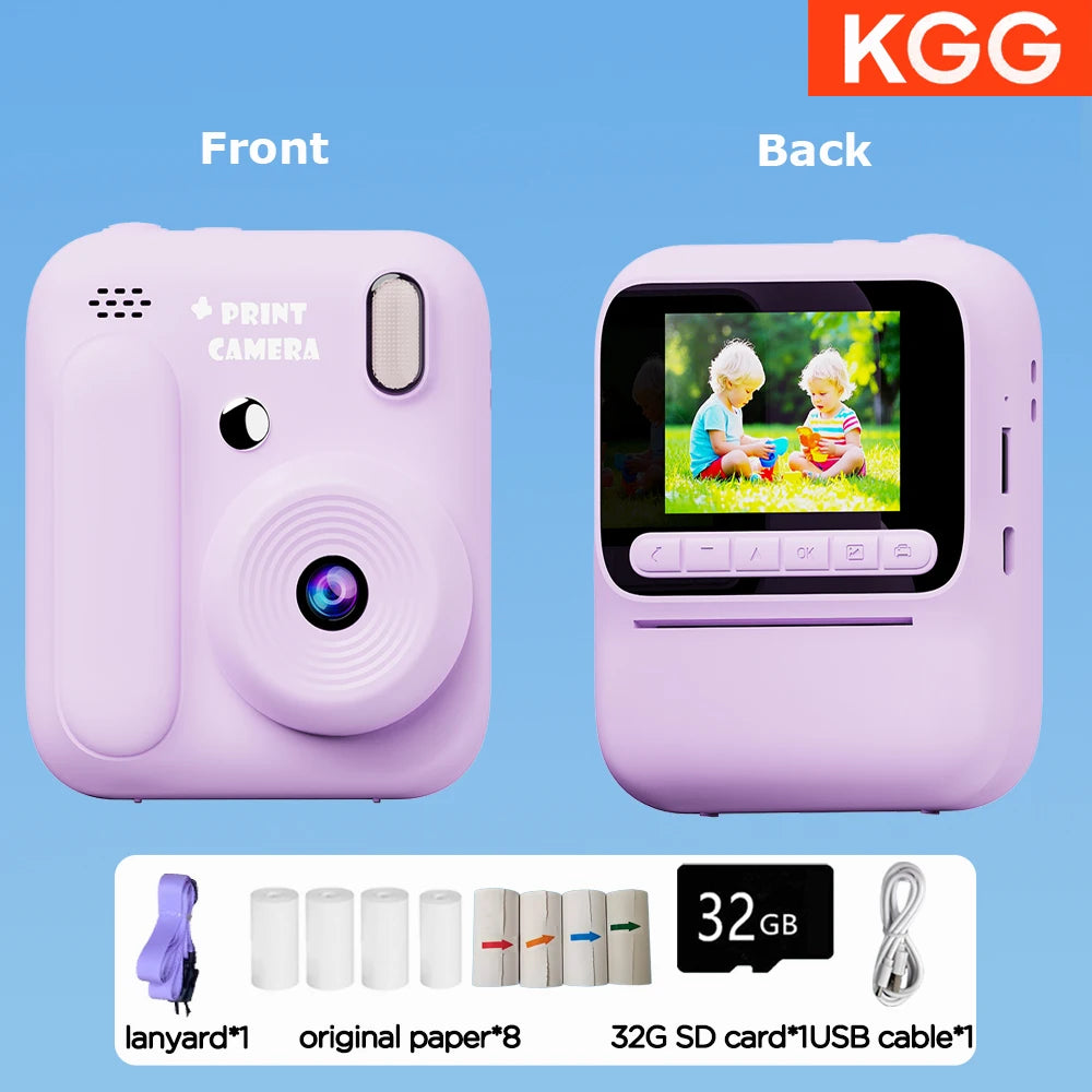 Front and back views of a pink instant print camera with accessories like a lanyard, paper, and USB cable.