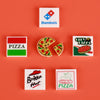 A collection of building blocks featuring Domino's, pizza, and brick-built food items.