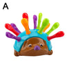 A colorful hedgehog fine motor skills toy with various colored plastic spikes for toddlers.