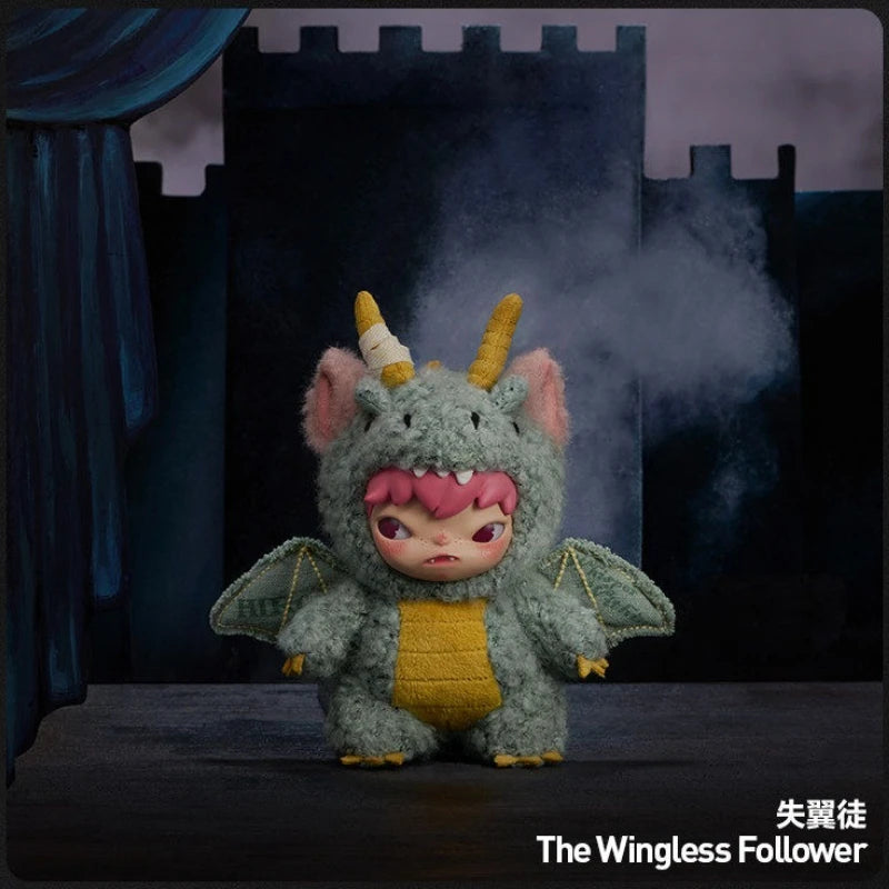 A fluffy gray plush doll with horns and yellow accents is shown in front of a dark castle backdrop with smoke effects.
