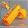 A bright yellow kids excavator digging toy tool for sand and snow