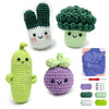 A set of seven crocheted green and purple amigurumi animals including a cactus, broccoli, and other cute figures.