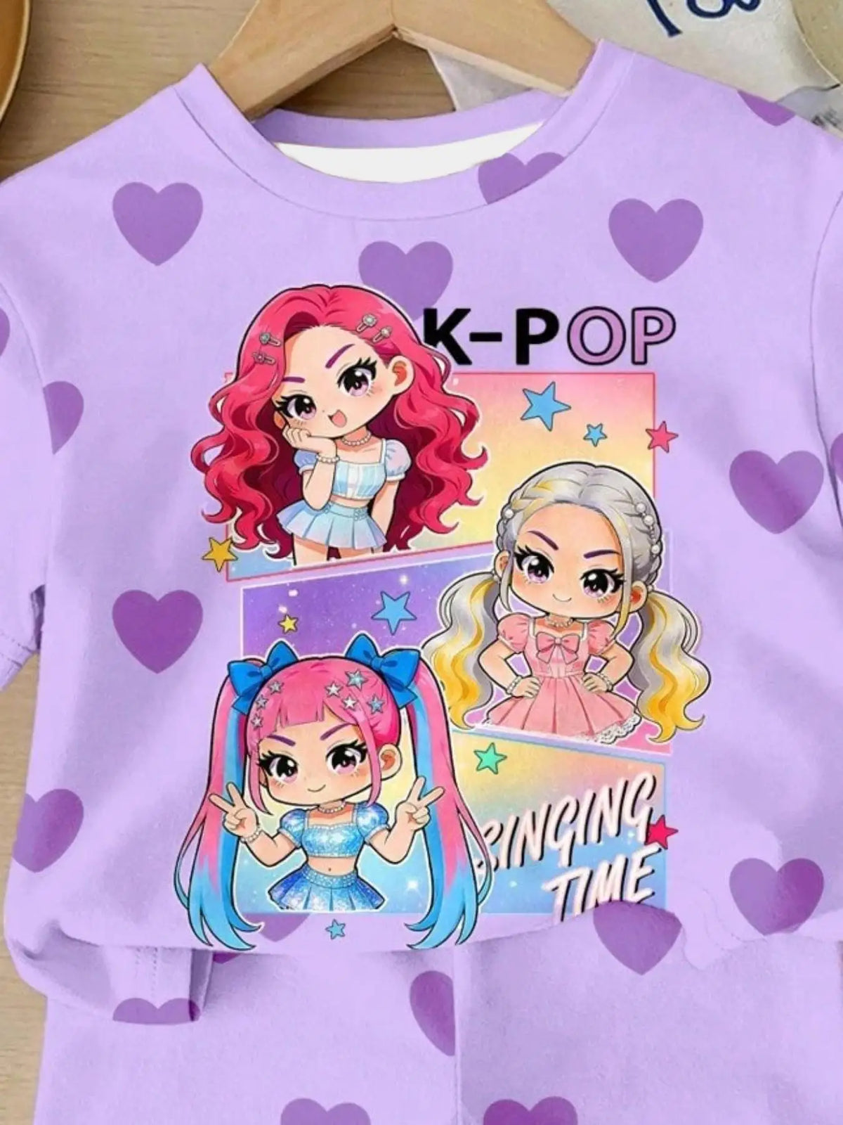A purple girls' two-piece summer set featuring K-Pop themed heart prints and illustrations of anime characters.