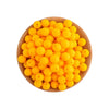 A pile of bright yellow silicone round beads for jewelry making and DIY crafts in a wooden bowl.
