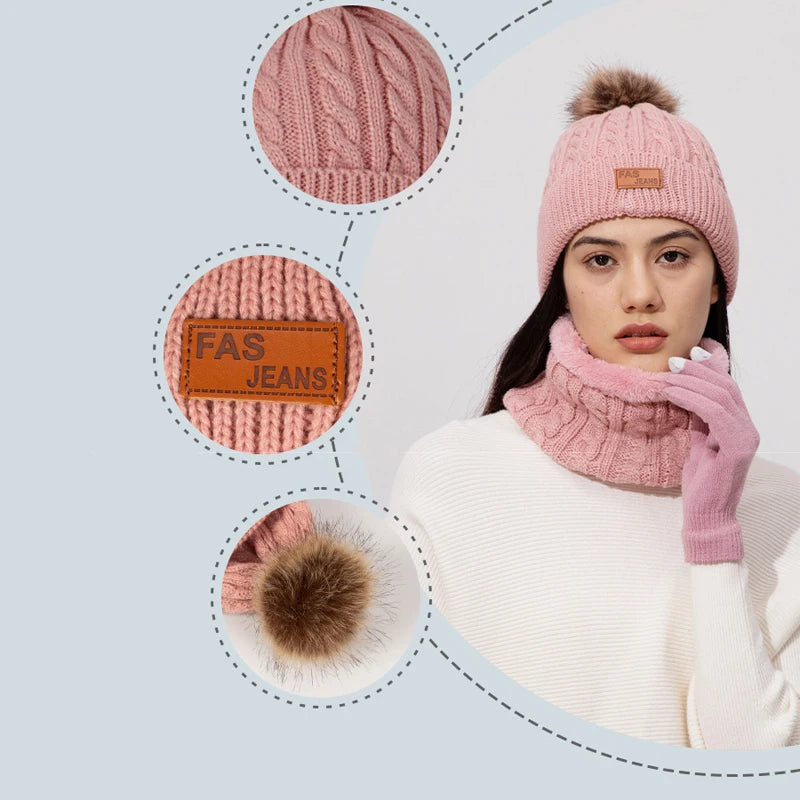 A model wears a pink knit winter hat, scarf, and gloves set with faux fur pom, featuring a light pink sweater.