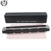 A black protective case for a 24-hole tremolo harmonica in C, shown next to the instrument.