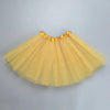 A yellow three-layer tutu skirt for girls with a ruffled waistband.